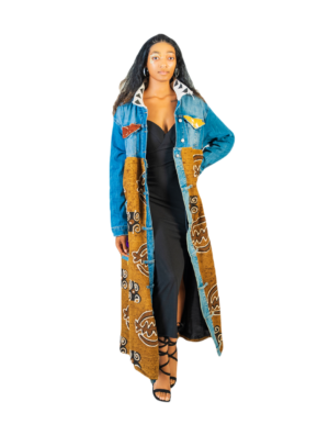 A woman in a long blue and brown coat