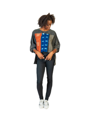 A woman standing with her hands on her hips