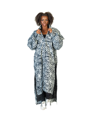 A woman in a long black and white coat